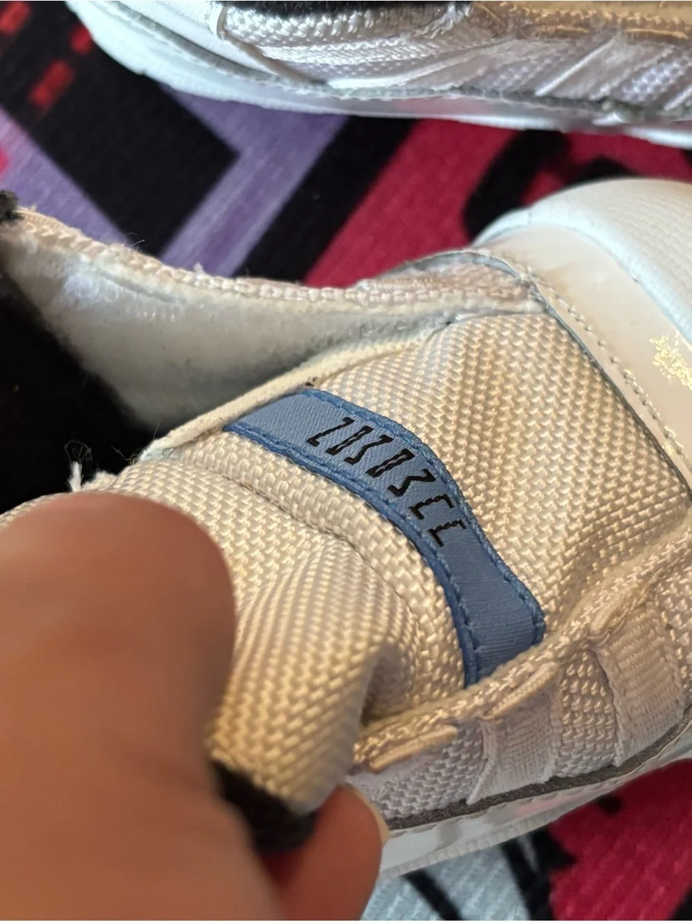 Jordan 11 retro Columbia White and Light Blue High-Top Sneaker